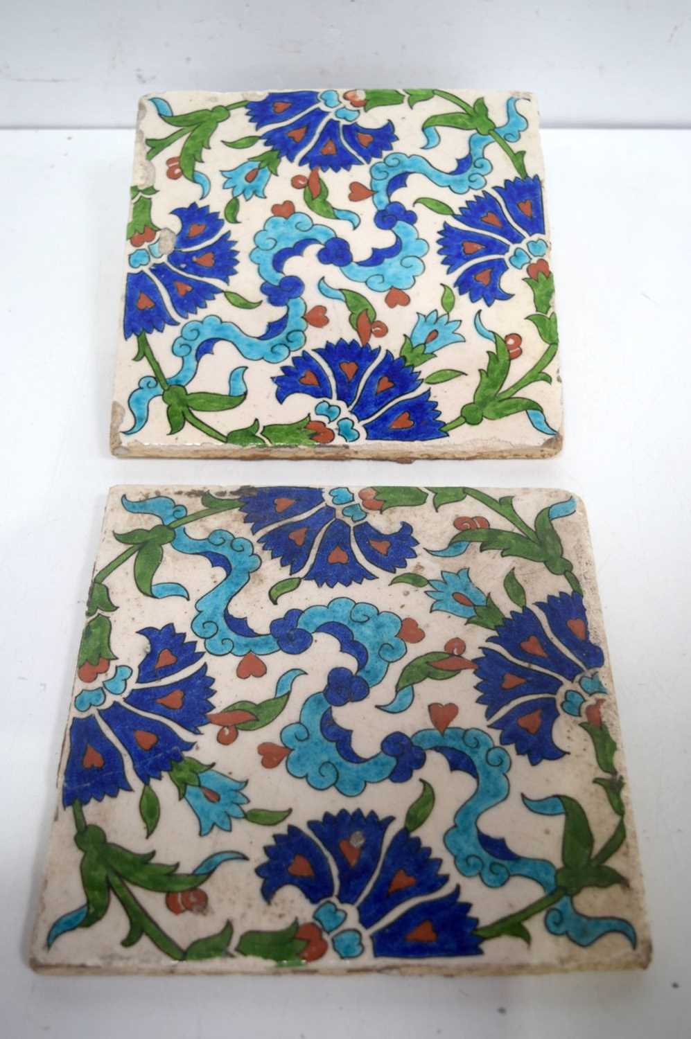 A pair of Iznik tiles.20 x 20 cm (2).