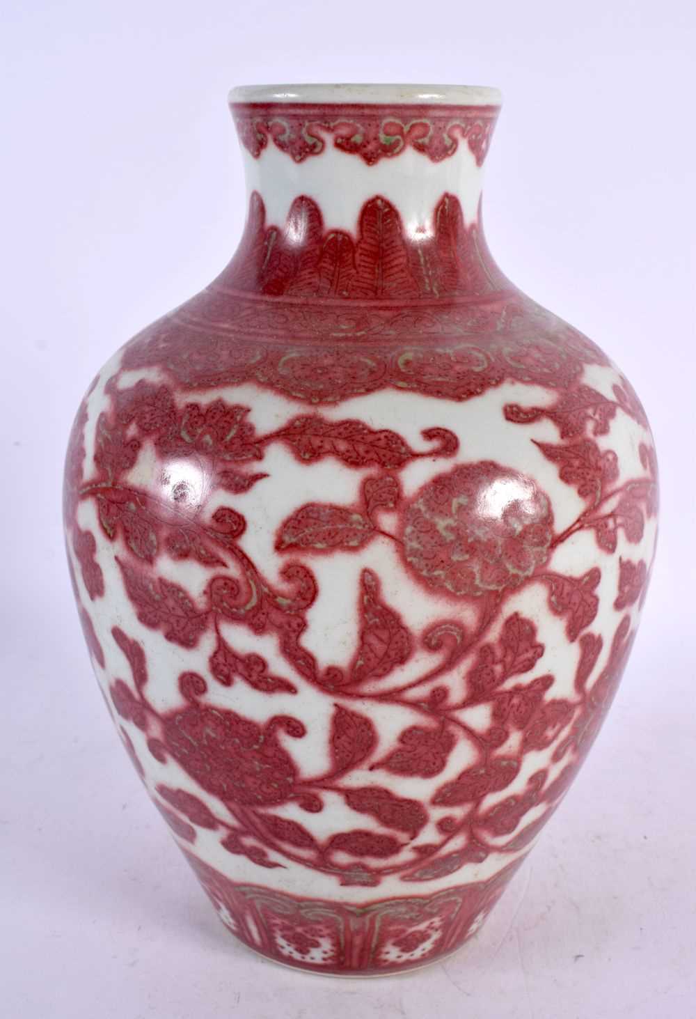 A CHINESE IRON RED PORCELAIN VASE 20th Century, painted in the Ming style. 24 cm x 12 cm.