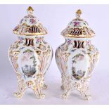 A PAIR OF 19TH CENTURY GERMAN HOSCHT PORCELAIN POT POURRI VASES AND COVERS painted with figures in