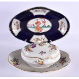 AN 18TH CENTURY GERMAN PORCELAIN SAUCE TUREEN AND COVER together with an English powder blue dish