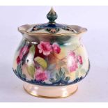 A ROYAL WORCESTER PORCELAIN POT POURRI AND COVER painted with flowers. 7 cm wide.