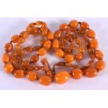 AMBER NECKLACE. Length 88cm, Largest Bead 14mm, weight 38g