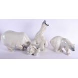 A LARGE FAMILY OF FOUR DANISH ROYAL COPENHAGEN PORCELAIN FIGURES modelled as polar bears in