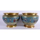 AN UNUSUAL PAIR OF 19TH CENTURY JAPANESE CHAMPLEVE ENAMEL BRONZE CENSERS decorated with Romanesque