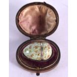 A RARE EARLY 19TH CENTURY SILVER AND ENAMEL SNUFF BOX unusually formed as a birds egg,