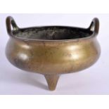 AN 18TH/19TH CENTURY CHINESE TWIN HANDLED BRONZE CENSER bearing Xuande marks to base. 11 cm x 9 cm.