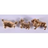 3 x 9CT GOLD CHARMS MODELLED AS A LION, A SCOTTIE DOG AND A PARROT. Hallmarked Birmingham 925.