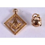 A 9CT GOLD MASONIC SQUARE AND COMPASS CHARM HALLMARKED BIRMINGHAM TOGETHER WITH A MASONIC BALL