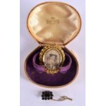 ANTIQUE VICTORIAN OPEN FACE GLASS SWIVEL LOCKET BROOCH TOGETHER WITH A BLUE GEM SET MOURNING