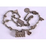 AN ORIENTAL SILVER NECKLACE WITH CHARMS. Chinese Marks, 70cm long, weight 82.1g