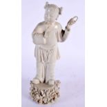AN 18TH CENTURY CHINESE BLANC DE CHINE PORCELAIN FIGURE OF A MALE Qing, possibly a representation of