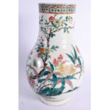 A 19TH CENTURY CHINESE FAMILLE ROSE PORCELAIN BULBOUS VASE Guangxu, painted with magpies in