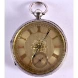 A VICTORIAN SILVER CASED POCKET WATCH WITH SILVERED DIAL AND GILT ROMAN NUMERALS. Hallmarked