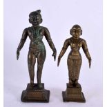 TWO 18TH CENTURY INDIAN BRONZE FIGURES OF BUDDHISTIC DEITIES modelled with breasts exposed upon a