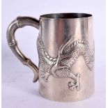 A LATE 19TH CENTURY CHINESE EXPORT SILVER DRAGON MUG by Wang Hing. 93 grams. 7 cm high.