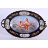 A 19TH CENTURY FRENCH SEVRES PORCELAIN TWIN HANDLED COMPORT painted with figures within