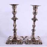 A PAIR OF 18TH/19TH CENTURY OLD SHEFFIELD PLATED CANDLESTICKS. 24 cm high.