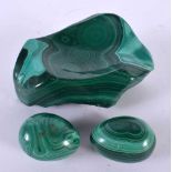 A RUSSIAN MALACHITE DESK STAND together with a matching pair of eggs. Largest 12 cm wide. (2)