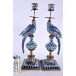 A PAIR OF CONTEMPORARY PARROT PORCELAIN CANDLESTICKS with bronze mounts. 47 cm high.