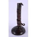 AN 18TH/19TH CENTURY PIG TWIST IRON CANDLESTICK. 18 cm high.