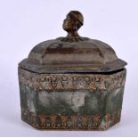 A RARE GEORGE III PAINTED LEAD TOBACCO JAR AND COVER formed with an Ethnic male head, with large