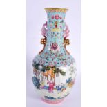 A CHINESE FAMILLE ROSE TWIN HANDLED PORCELAIN VASE 20th Century, bearing Qianlong marks to base,