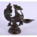 A LARGE MIDDLE EASTERN INDIAN PERSIAN BRONZE OIL LAMP formed as a bird. 20 cm x 15 cm.