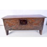 An 18th Century carved oak Coffer 31 x 65 x 22 cm.