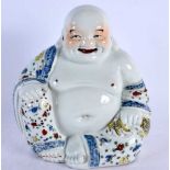 AN EARLY 20TH CENTURY CHINESE FAMILLE ROSE PORCELAIN FIGURE OF A BUDDHA Late Qing/Republic. 22 cm