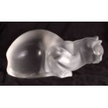 A LARGE FRENCH LALIQUE GLASS FIGURE OF A CAT modelled recumbent. 22 cm x 8 cm.