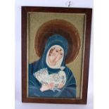 A RARE 19TH CENTURY EMBROIDERED PANEL OF A SAINT modelled holding a bird. 62 cm x 48 cm.