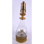 AN EARLY 20TH CENTURY CASTEL MERCURY GLASS OIL LAMP. 35 cm high.