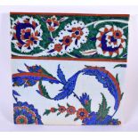 A LARGE TURKISH OTTOMAN MIDDLE EASTERN IZNIK TYPE TILE painted with flowers. 27 cm square.