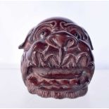 A JAPANESE CARVED WOOD NETSUKE IN THE FORM OF A SHISHI DOG HEAD. 4.4cm x 5cm x 5cm