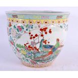 A CHINESE REPUBLICAN PERIOD FAMILLE ROSE PORCELAIN JARDINIERE painted with birds and foliage. 23
