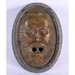 A VERY RARE ANTIQUE MIXED METAL MASK HEAD CHEROOT CIGAR CUTTER unusually formed as an oval with