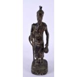 AN 18TH/19TH CENTURY MIDDLE EASTERN BRONZE FIGURE OF A MALE modelled holding a staff & teapot. 23 cm