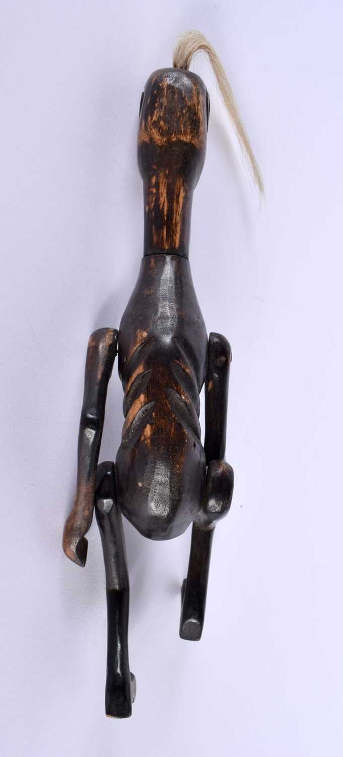 AN UNUSUAL AFRICAN ARTICULATED FLY WHISK HEAD FIGURE. 21 cm high. - Image 4 of 4