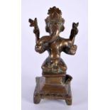 A 17TH/18TH CENTURY INDIAN BRONZE FIGURE OF GANESHA modelled upon a square form base. 12 cm high.