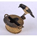 AN ANTIQUE AUSTRIAN COLD PAINTED BRONZE MAGPIE BASKET SMOKERS STAND. 7 cm x 6.5 cm.