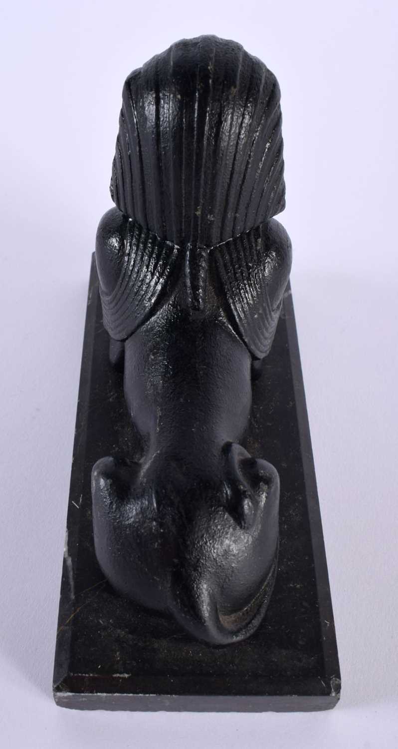 A 19TH CENTURY GRAND TOUR BLACK PAINTED METAL AND MARBLE MODEL OF A SPHINX After the Antiquity. 18 - Image 4 of 5