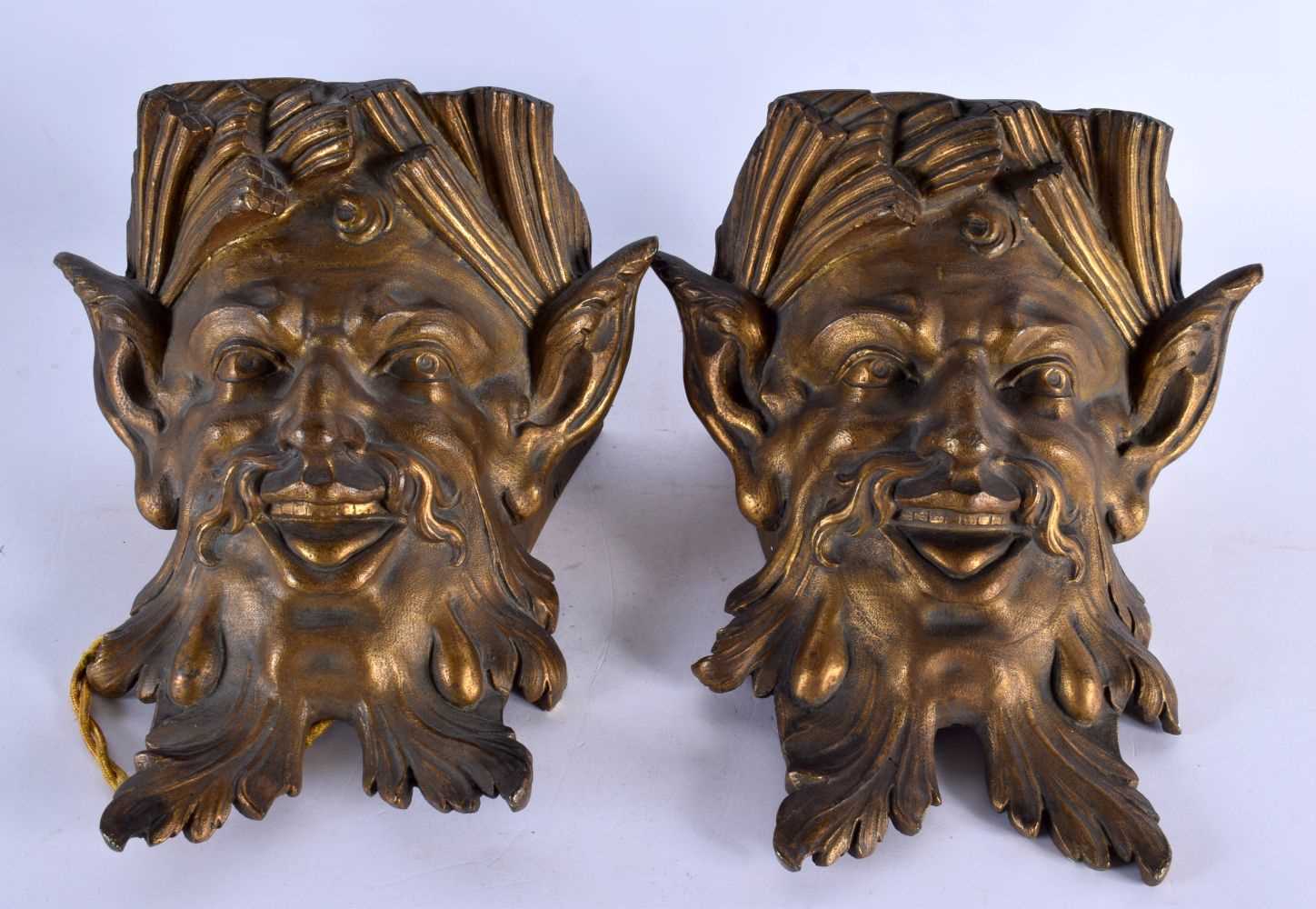 A FINE PAIR OF EARLY 19TH CENTURY FRENCH GILT BRONZE WALL LIGHTS formed as bearded mask head