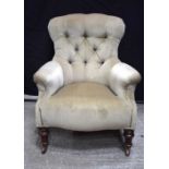An antique upholstered armchair 90 x 70 x 90 cm .