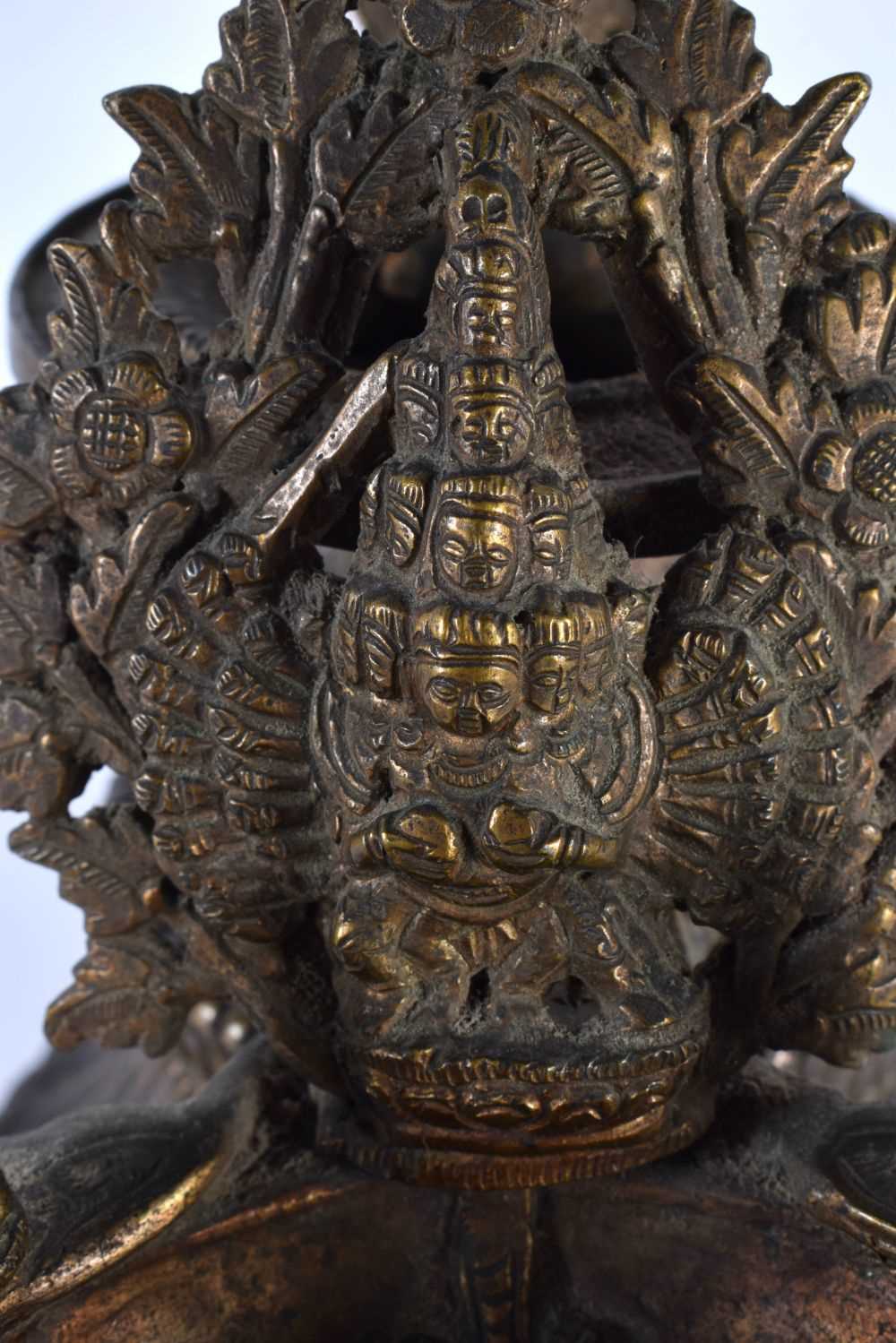 A RARE 18TH/19TH CENTURY TIBETAN NEPALESE BRONZE SUKUNDA LAMP the body decorated all over with - Image 5 of 10