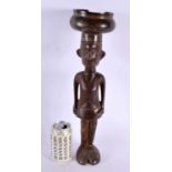 A LARGE AFRICAN TRIBAL CARVED WOOD FIGURE modelled as a male with hoof feet. 45 cm high.