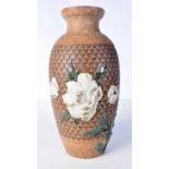 A Doulton Lambeth vase decorated with flowers 28 cm.