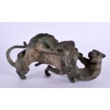 A MIDDLE EASTERN BRONZE GROUP OF FIGHTING ANIMALS. 16 cm x 9 cm.