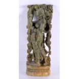 A FINE 19TH CENTURY INDIAN CARVED GREEN STONE FIGURE OF A DEITY possibly jade, modelled as a