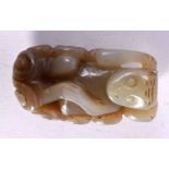 A 19TH CENTURY CHINESE CARVED GREENISH RUSSET JADE MONKEY Qing. 5 cm x 3.5 cm.