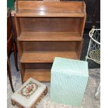 A large Oak standing Bookshelf, Lloyd Loom laundry basket and a small footstool (3)